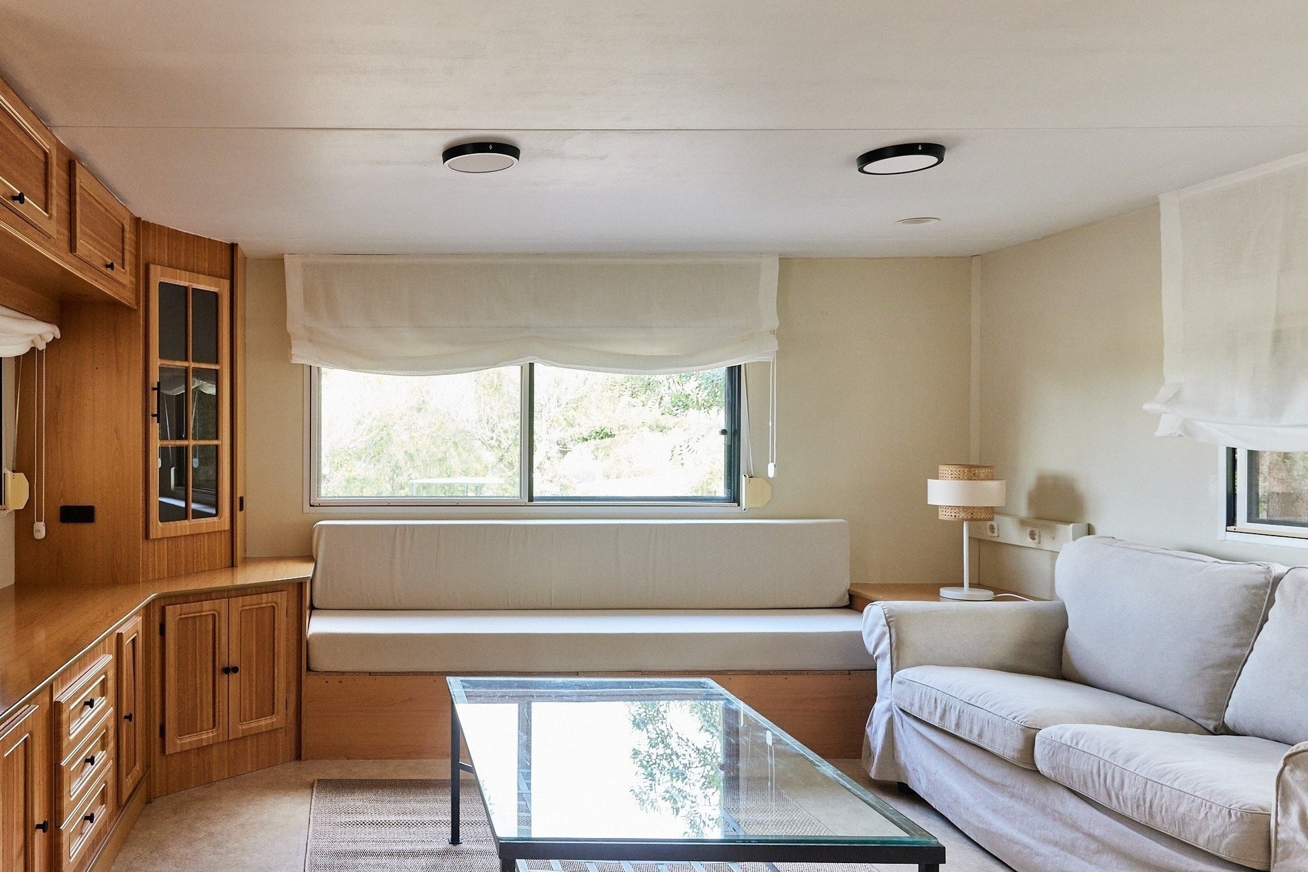 a living room with a couch and a table