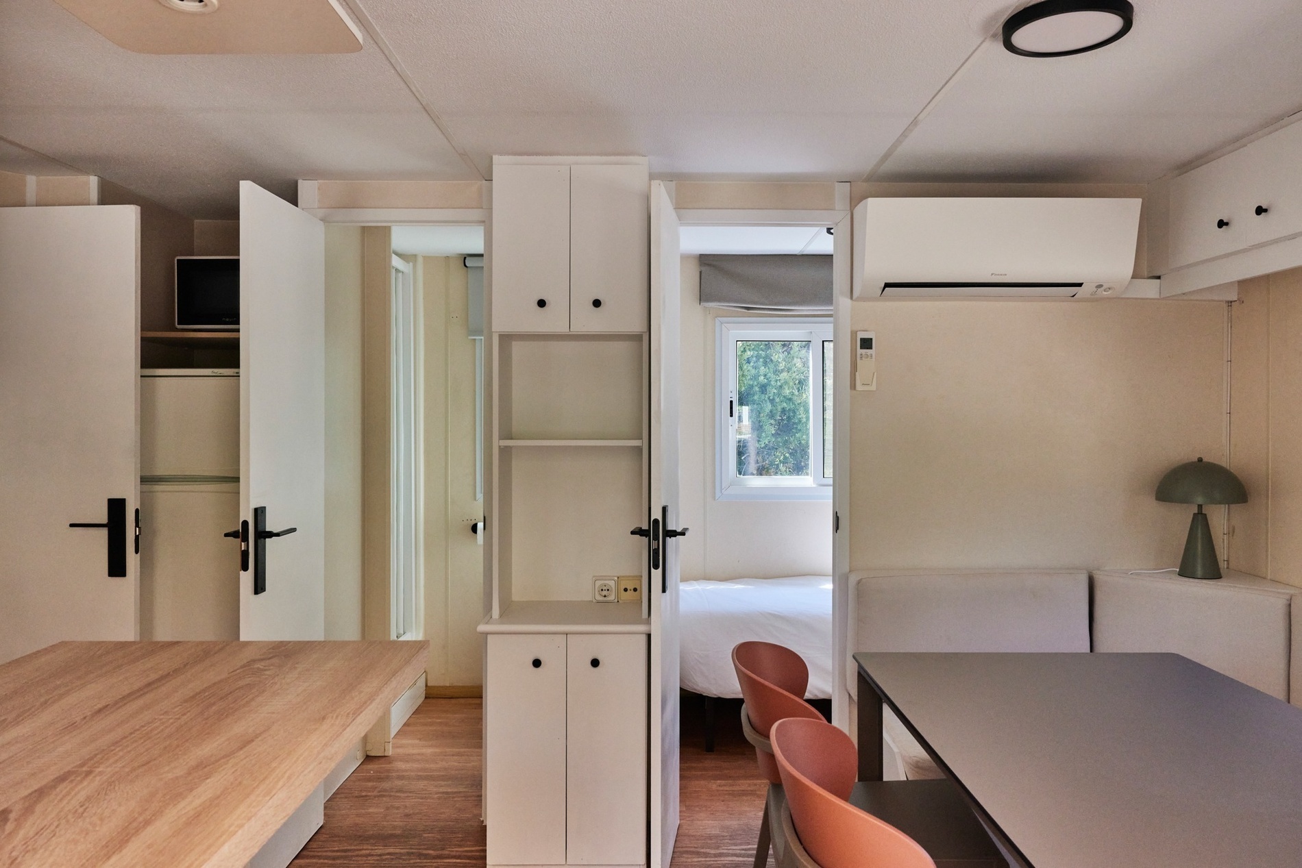 a room with a table and chairs in it