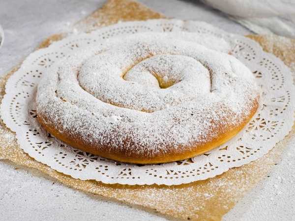 a view of a beach with a mountain in the background