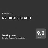 a black sign that says ' awarded to r2 buganvilla hotel & spa ' on it