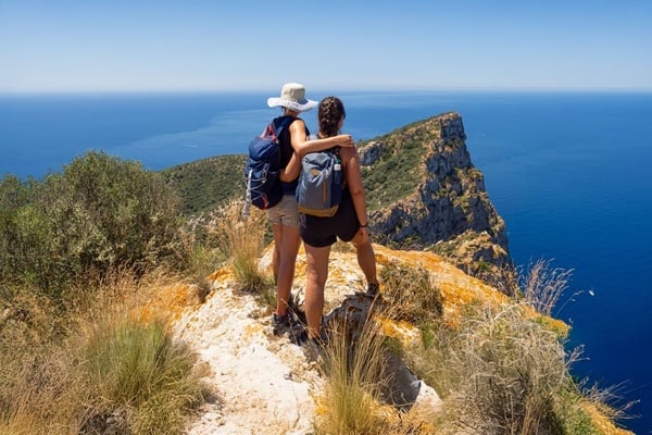 an aerial view of a body of water with boats in it