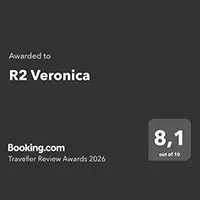R2 Hoteles: Corporativa, Booking.com Traveler Review Award 2026.