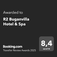 une étiquette noire qui dit " primé à r2 buganvilla hotel & spa "
