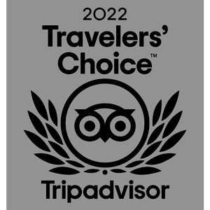 un logo TripAdvisor 'Choix des voyageurs' avec un hibou et une couronne de laurier