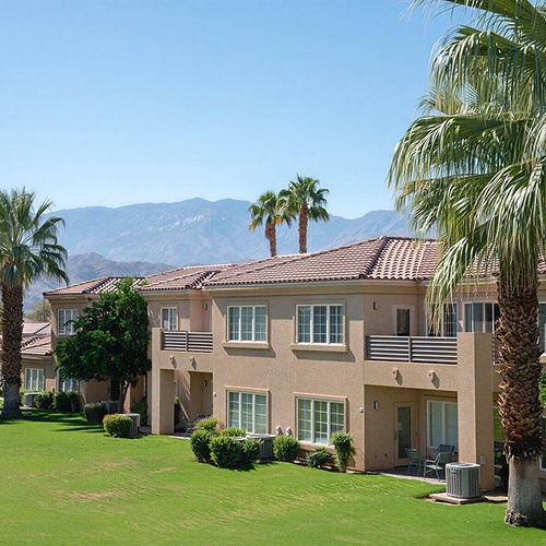 Travel Raintree Corpo: Sunny apartments with palm trees and mountains.