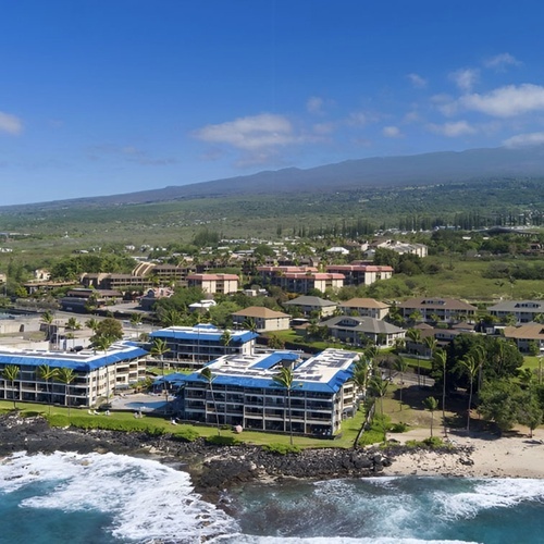 Travel Raintree Corpo: Coastal resort with mountain and ocean views.