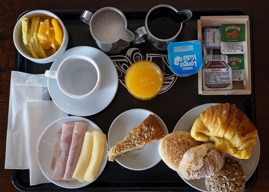 a tray of food includes a nestle yogurt and nutella