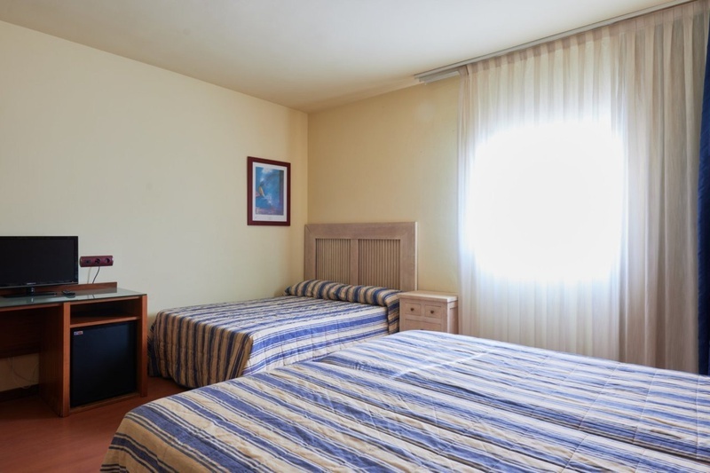 Habitación clásica, confort y funcionalidad