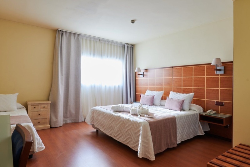 Habitación clásica, confort y funcionalidad