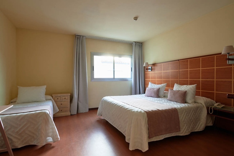 Habitación clásica, confort y funcionalidad