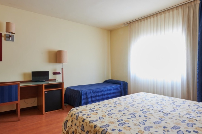 Habitación clásica, confort y funcionalidad