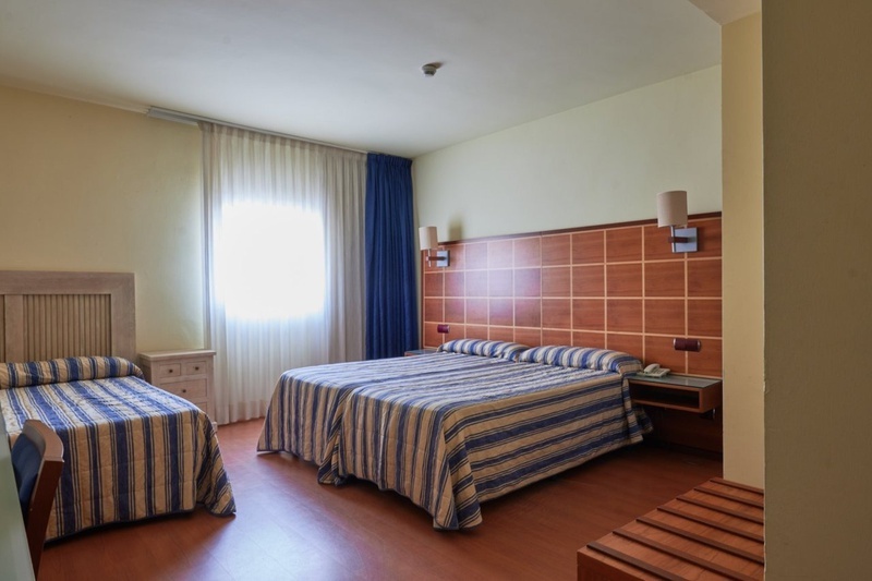 Habitación clásica, confort y funcionalidad