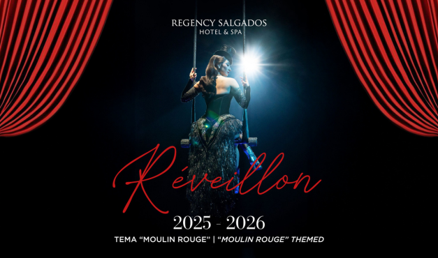 uma máscara de carnaval dourada e um colar de contas douradas em um fundo preto .