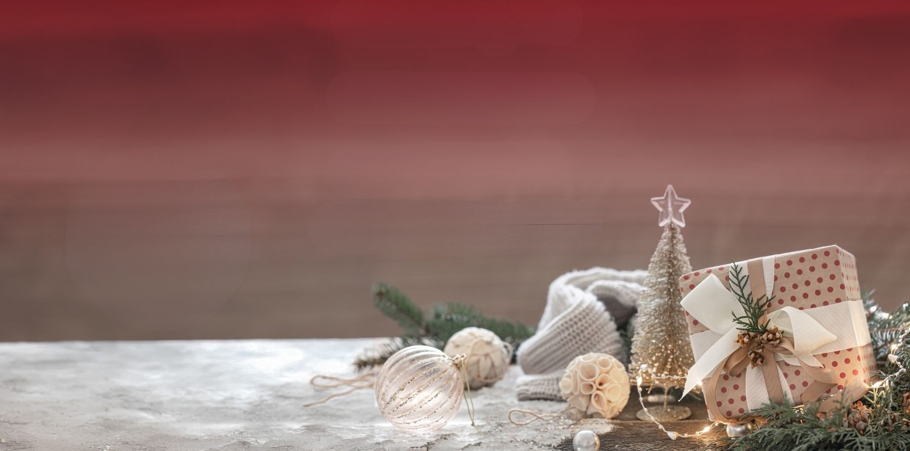 a christmas tree with blue lights and a star on top