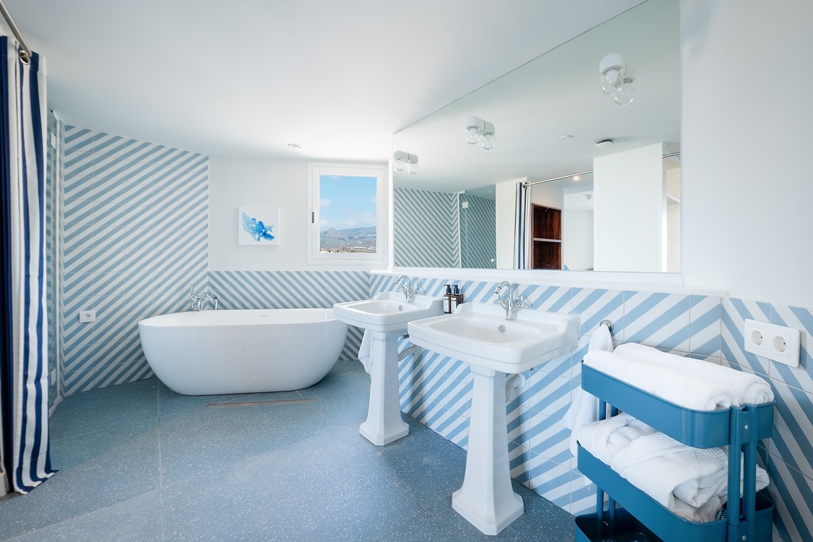Luxury Satocan: The Salmar bathroom with freestanding tub and double sinks.