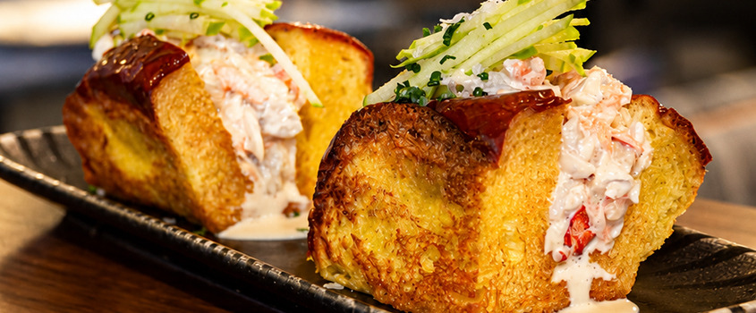 Gourmet lobster rolls on brioche with apple slaw, a Satocan: The Salmar delight.