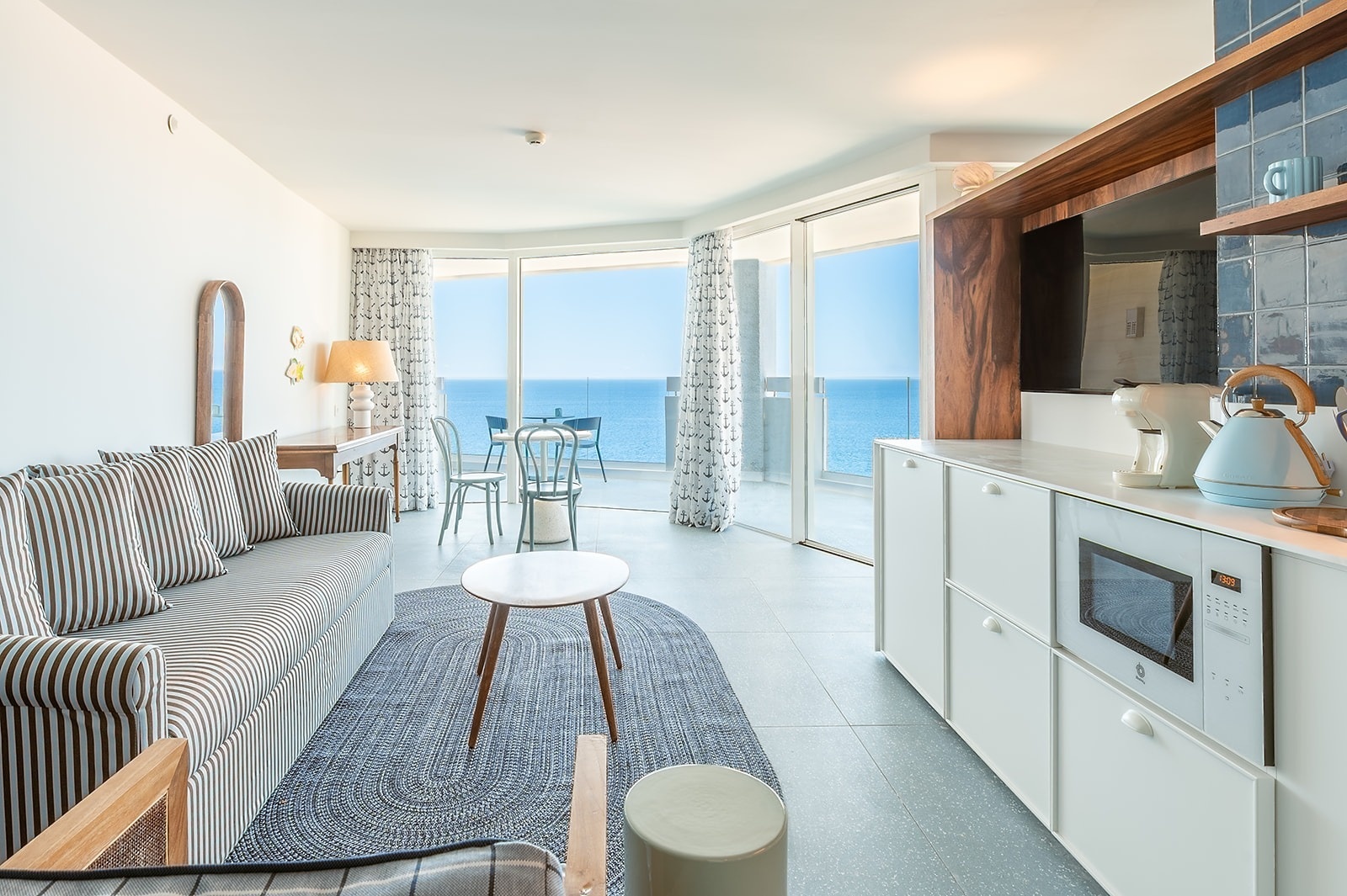 Satocan: The Salmar offers a suite with ocean views, a sofa, kitchenette, and balcony.