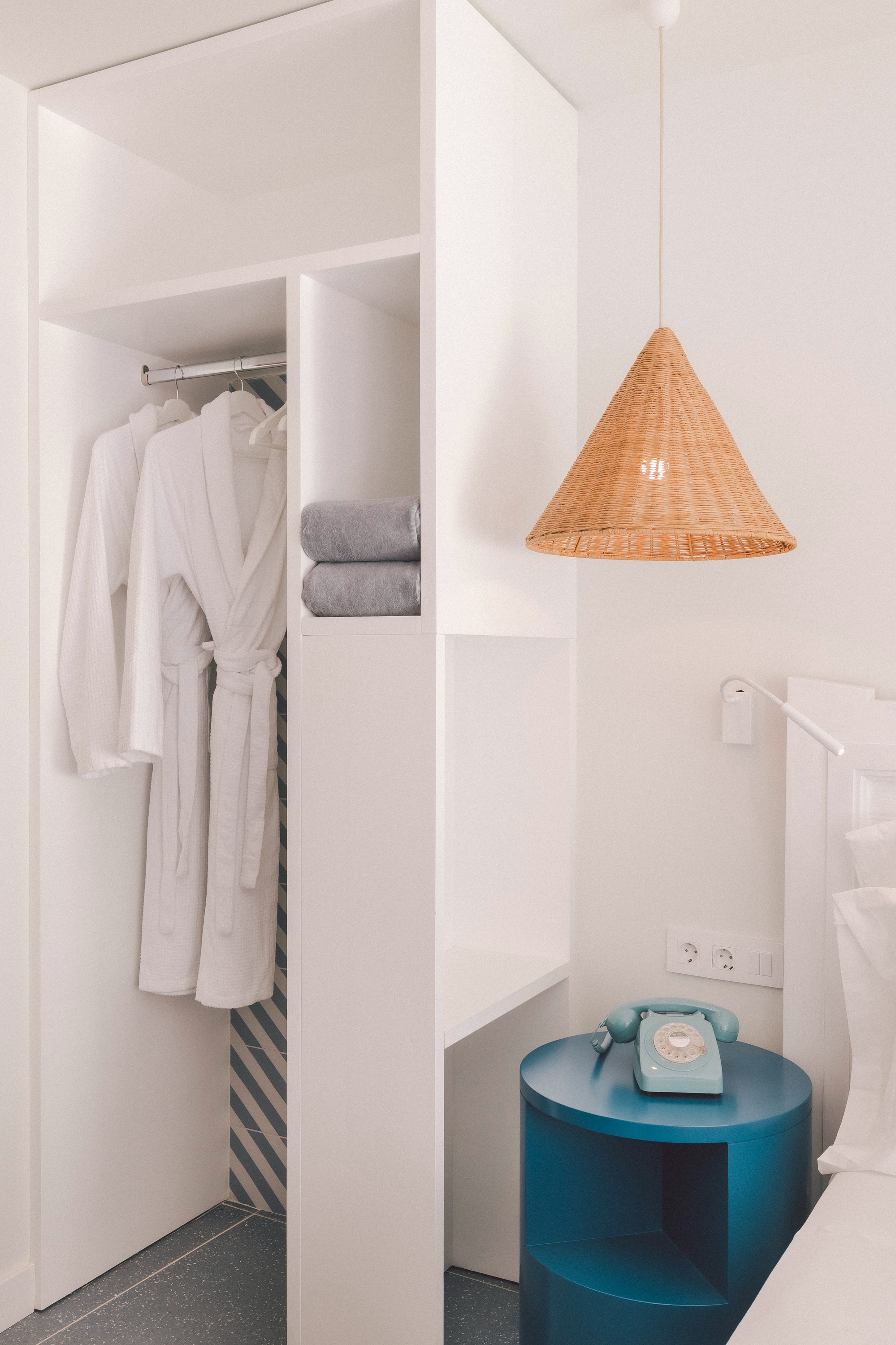 a bathroom with a sink and bottles of carolin