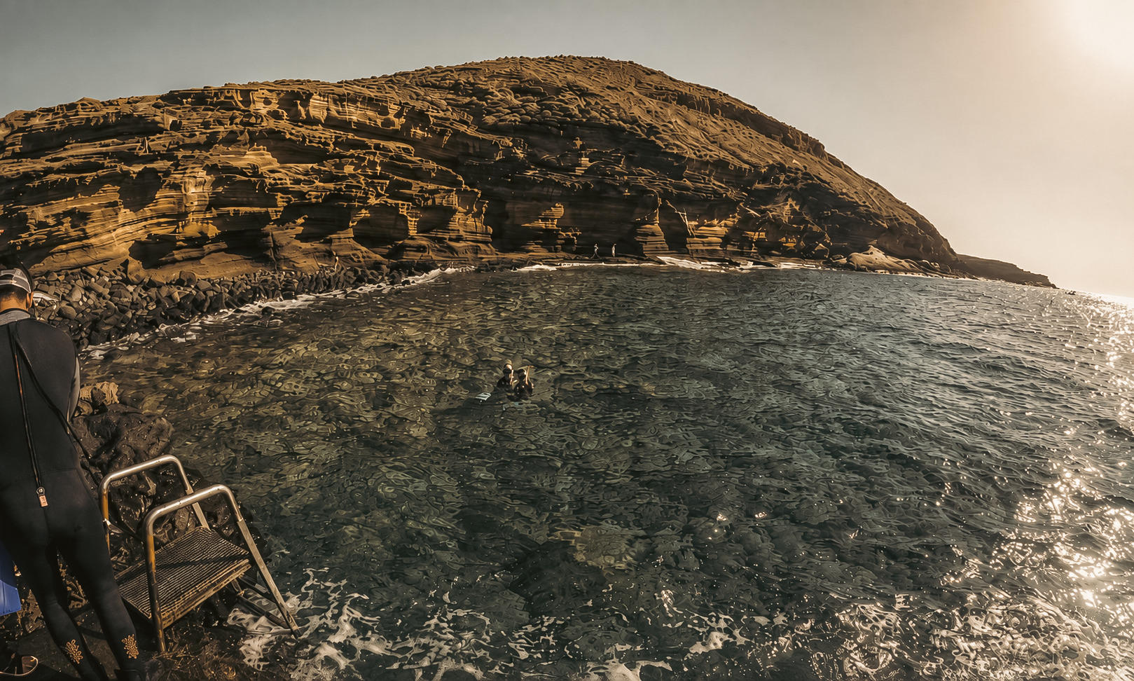 Satocan: The Salmar, snorkel & dive in clear waters by dramatic cliffs.