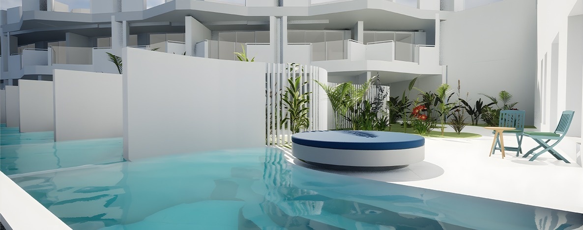 A sleek, modern outdoor setting features a vibrant blue swimming pool surrounded by white buildings, lush tropical plants, and contemporary seating.