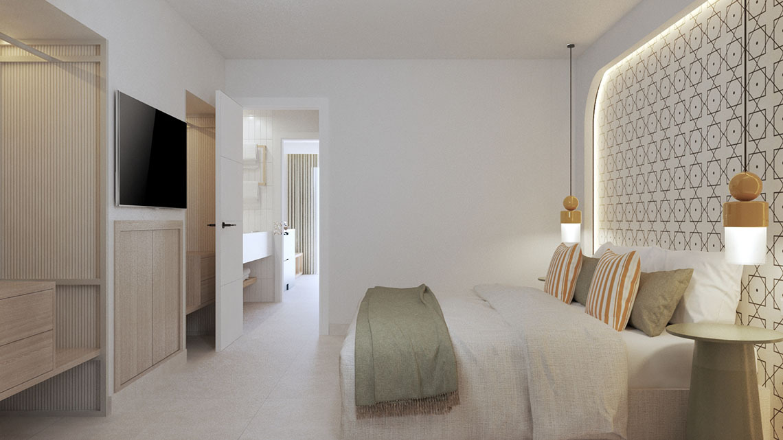 Modern hotel bedroom with geometric headboard, mounted TV, and open bathroom entrance. Sands Beach