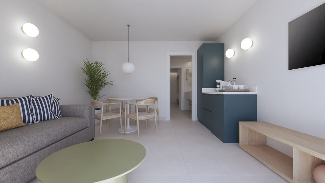 Modern hotel bedroom with geometric headboard, mounted TV, and open bathroom entrance. Sands Beach