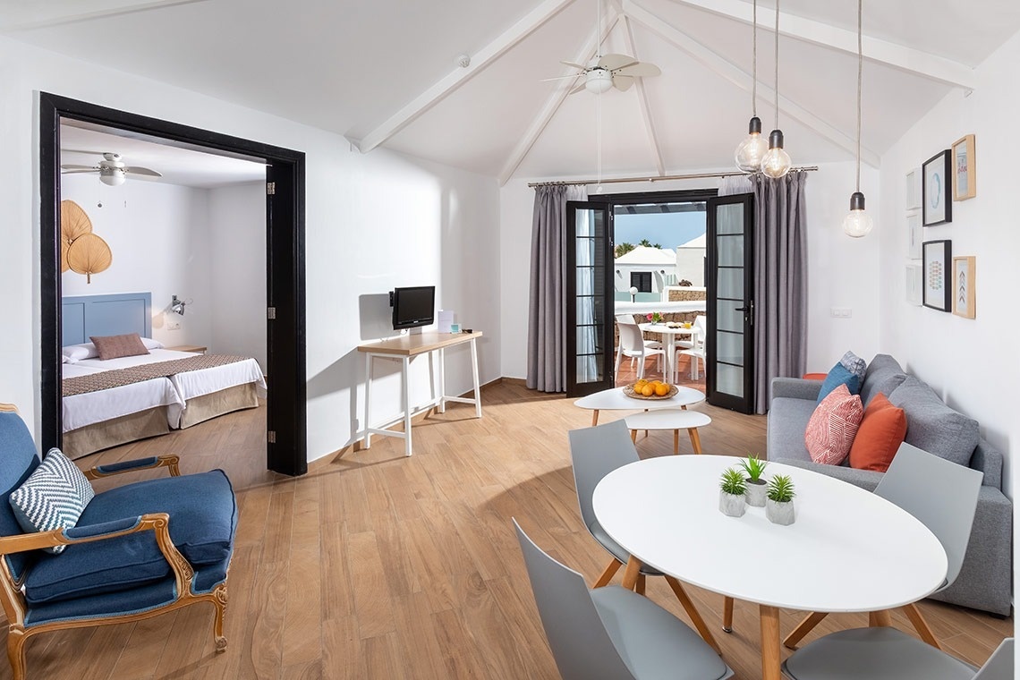 a living room with a couch and a table