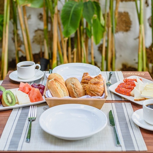a table with a sign that says schweppes on it