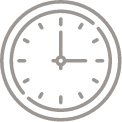a black and white clock with a white circle around it on a black background .
