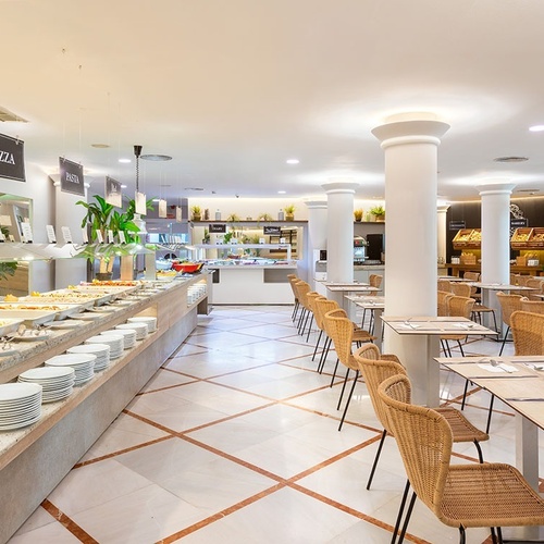 a restaurant with a sign that says pizza on it