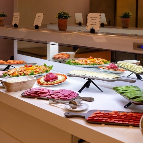 a buffet table with a sign that says ' sarma ' on it