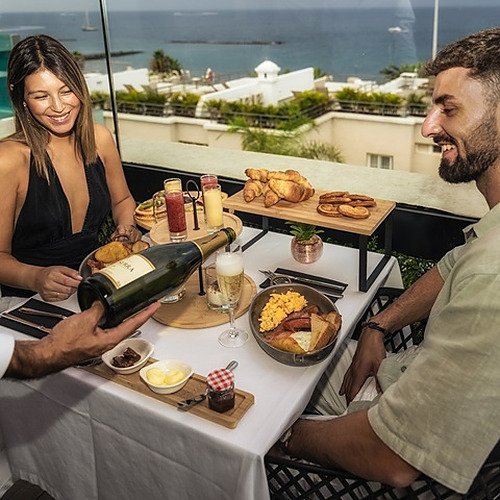 Enjoy a brunch at the Skybar Margarita's with sea views.