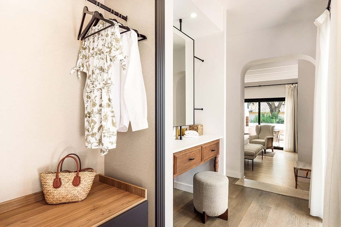 a hotel room with a bed and a bathroom