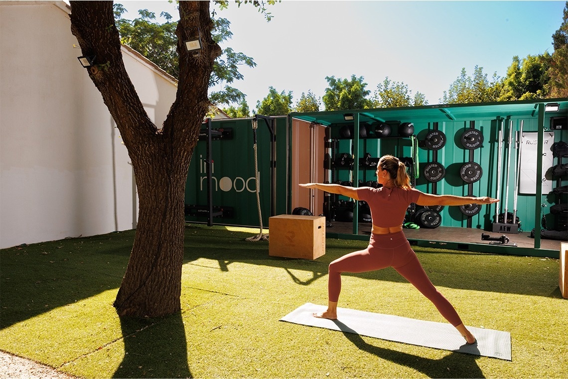 a black and white dog with its tongue hanging out