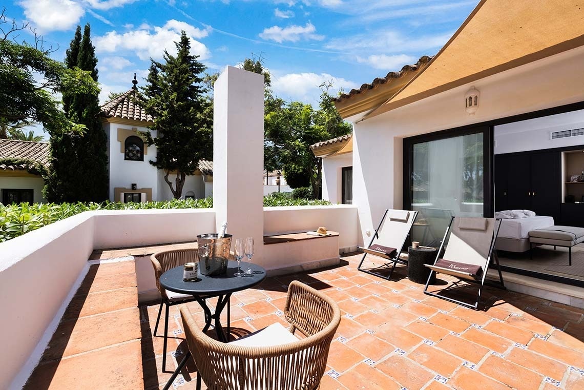an artist 's impression of a kitchen with a table and chairs