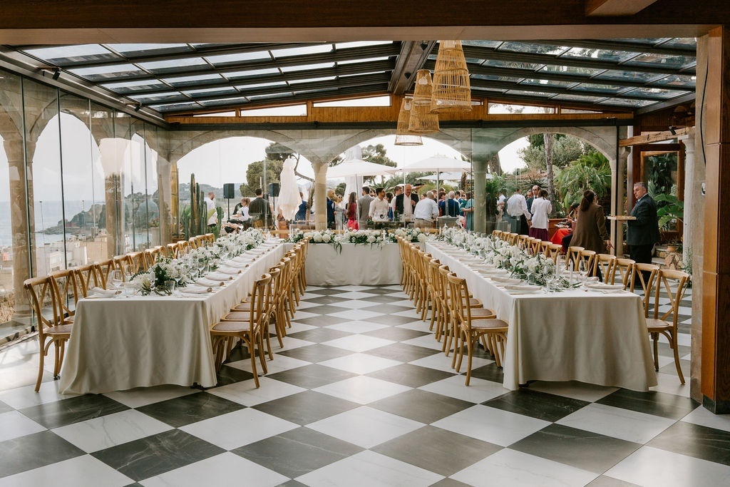 Elegant wedding banquet at Roger De Flor By Seleqtta with sea views.
