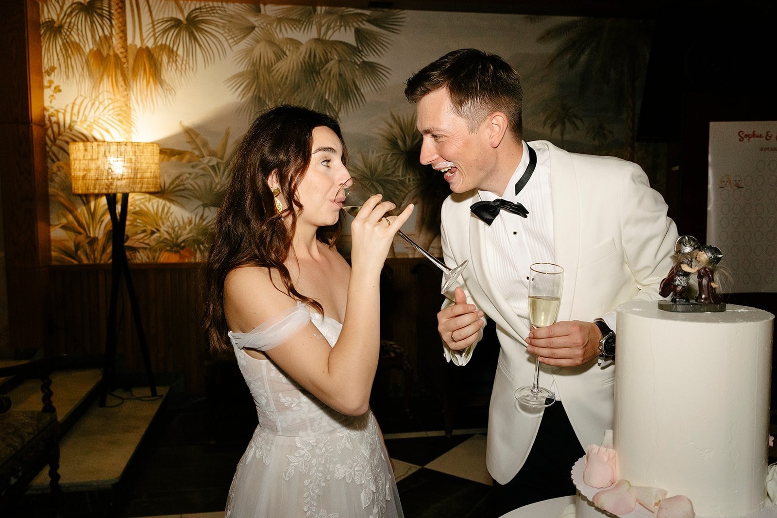 Newlyweds toasting at Roger De Flor By Seleqtta.
