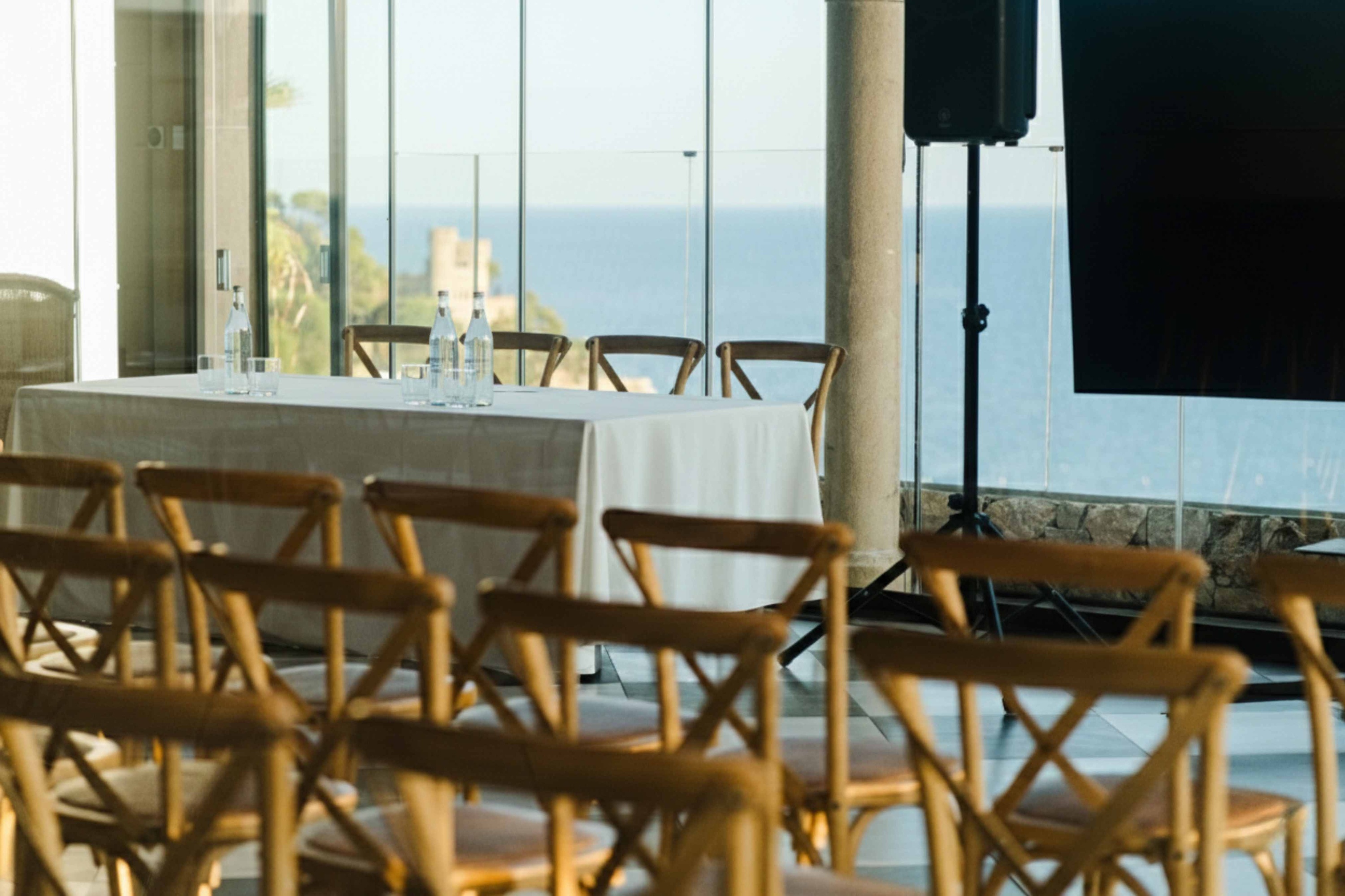 Roger De Flor By Seleqtta: sea view meeting room with wooden chairs.