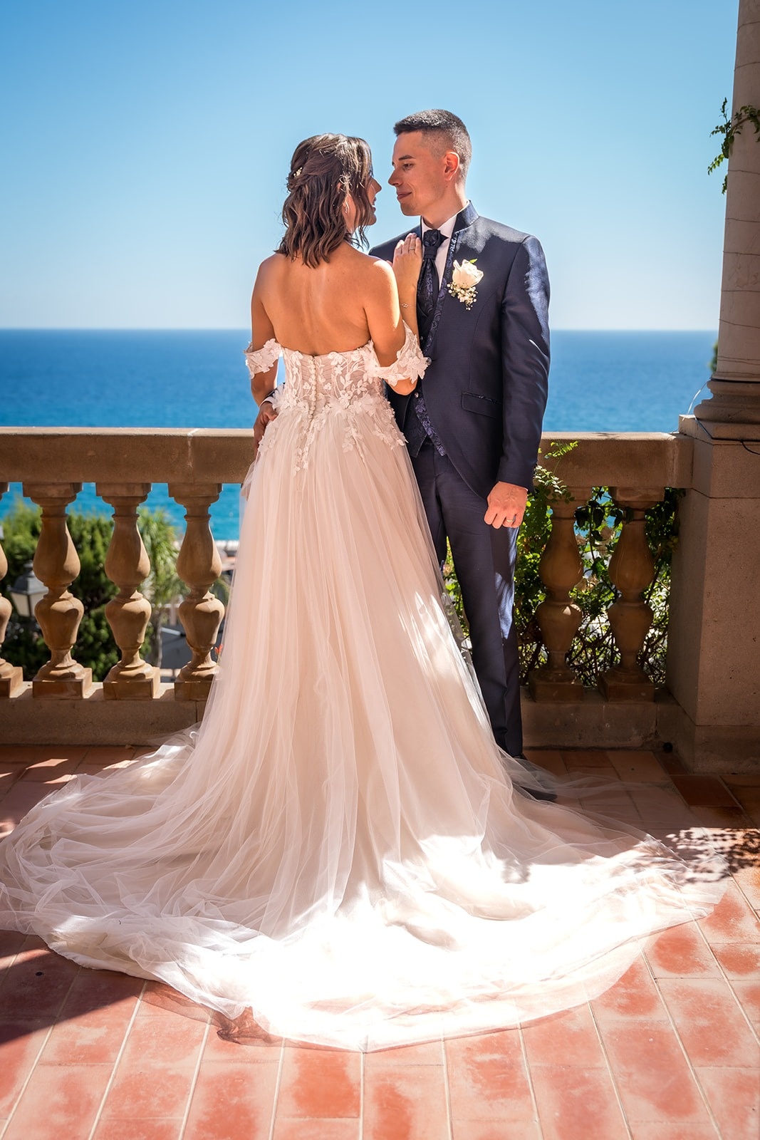 Newlyweds on balcony at Roger De Flor By Seleqtta, sea views.