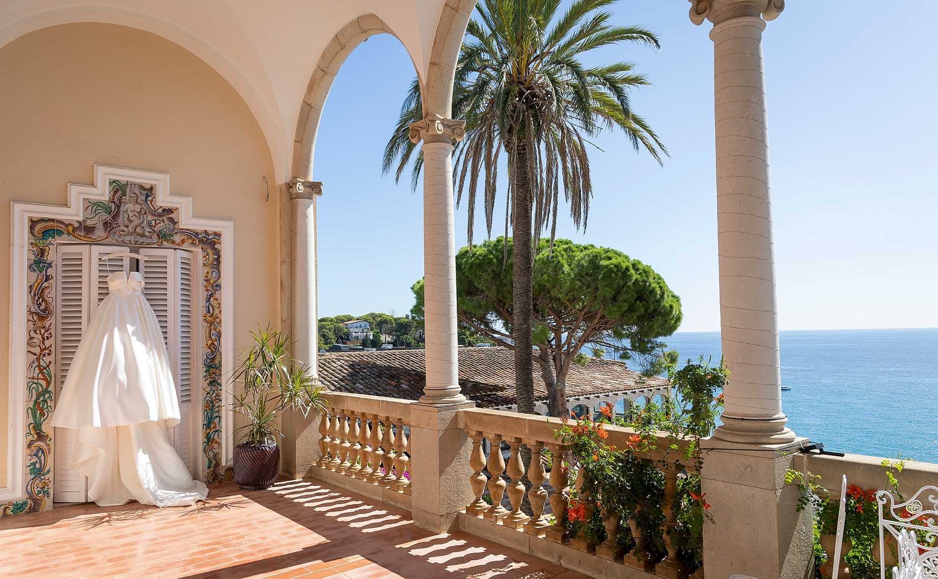 Roger De Flor By Seleqtta: Wedding dress on balcony with stunning sea views.