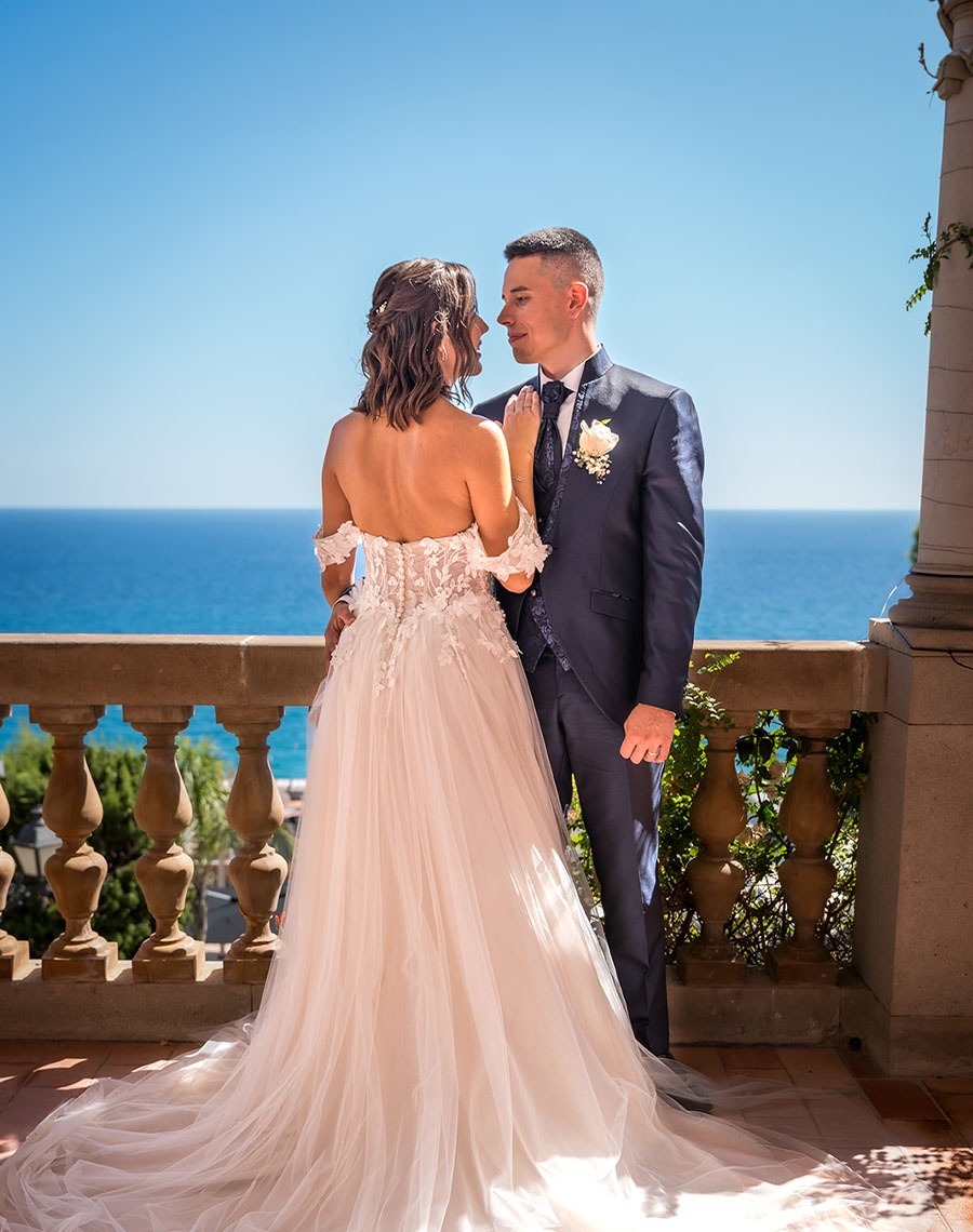 Newlyweds on balcony overlooking the sea, Roger De Flor By Seleqtta.