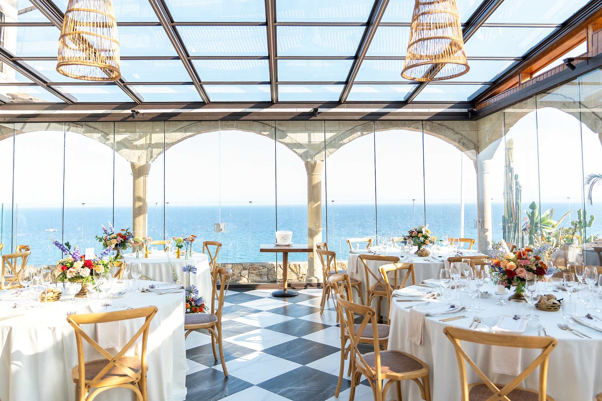 Roger De Flor By Seleqtta venue with sea views, set tables.