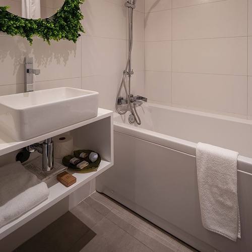 a bathroom with a sink and a bathtub