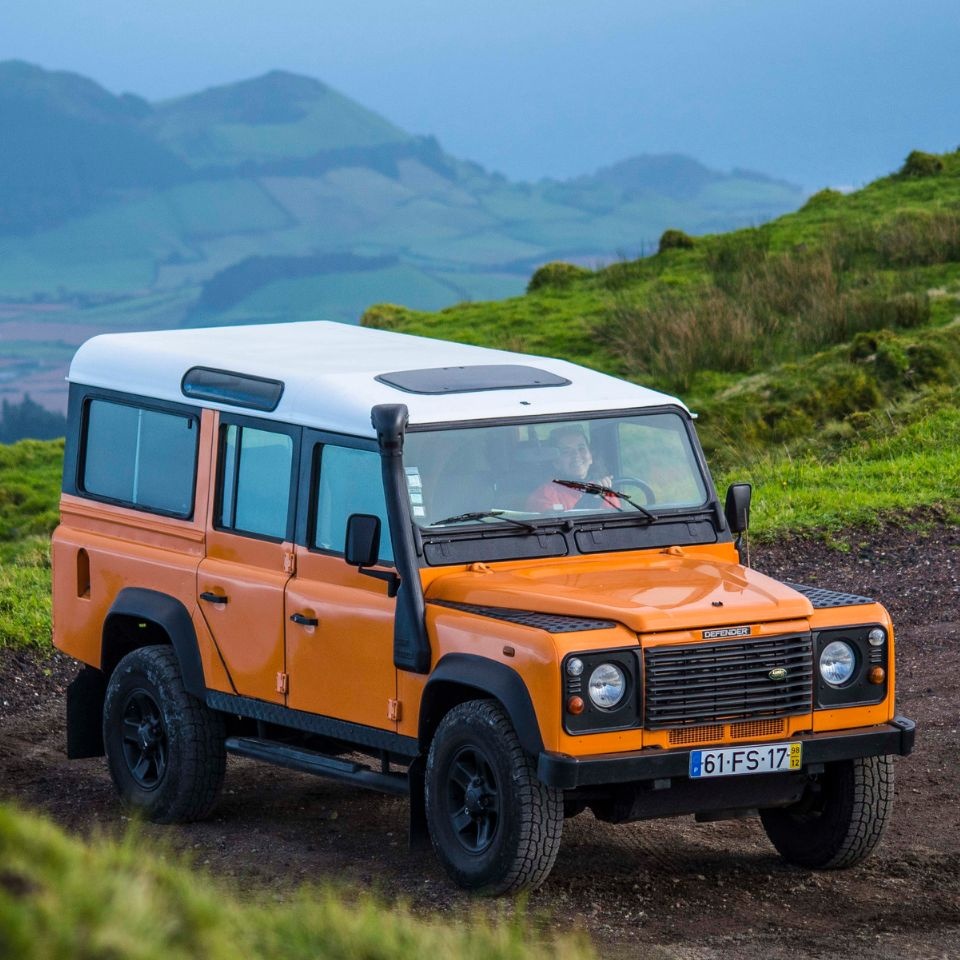 Jeep at the foot of a lagoon