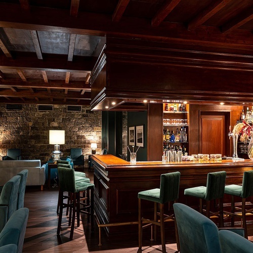 a bar with a lot of bottles on it