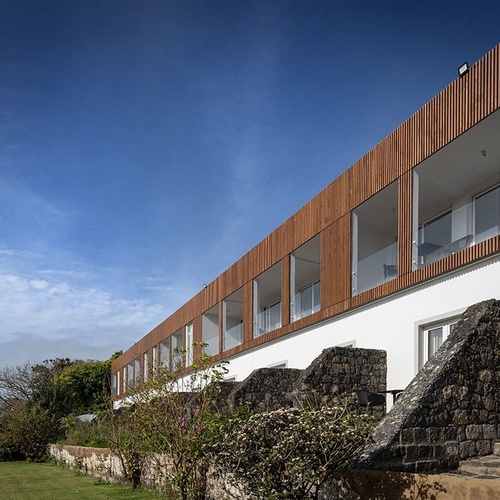 a large building with a lot of windows and stairs