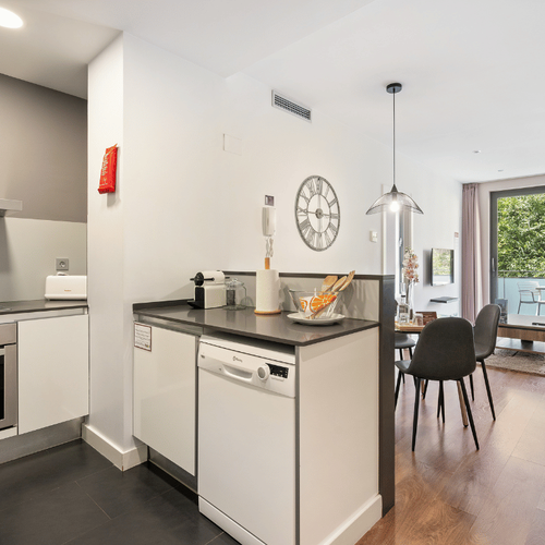 Kitchen open to dining room 1-bedroom apartment