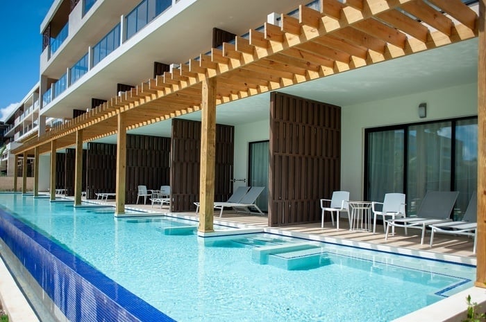 a view of a swimming pool from a hotel room