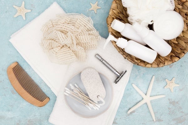 a woman is laying in a bathtub with her eyes closed