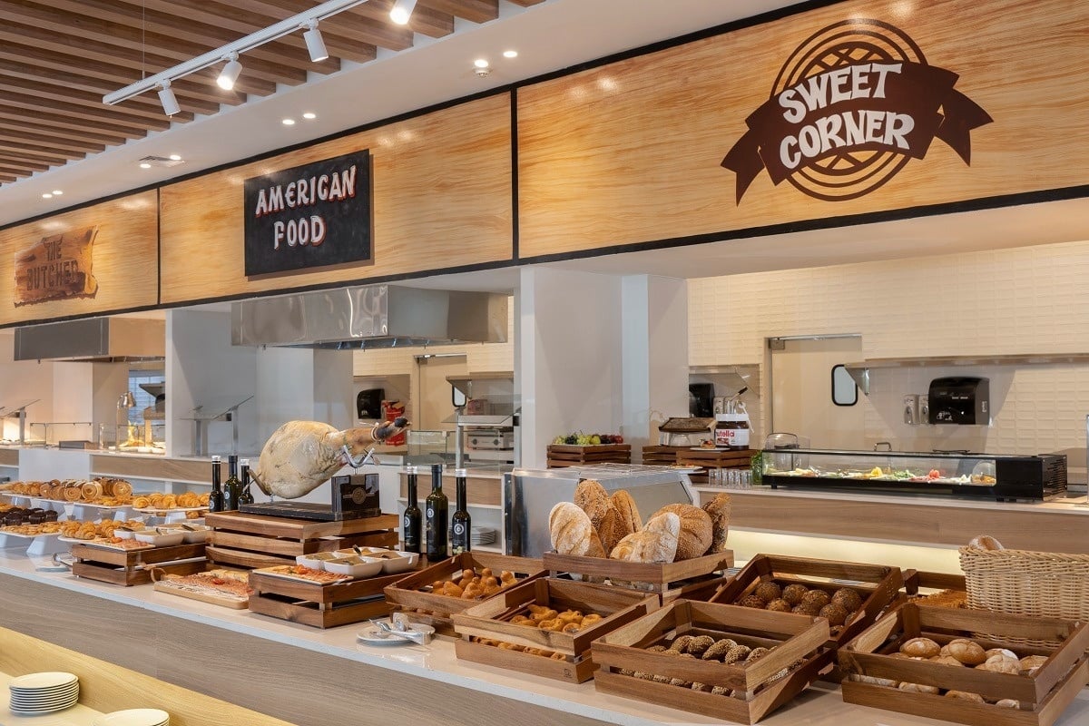 a buffet with a sign that says sweet corner